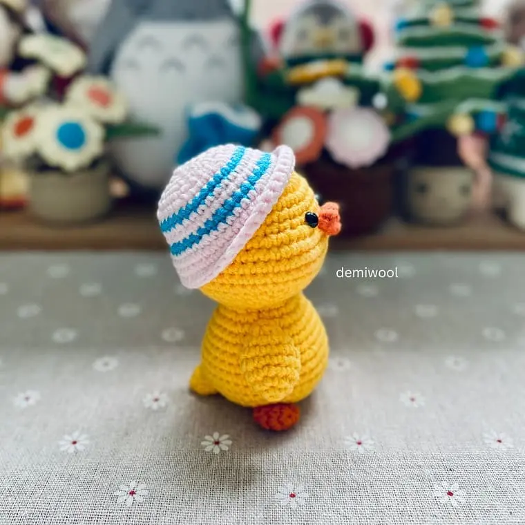 Amigurumi duck with a hat