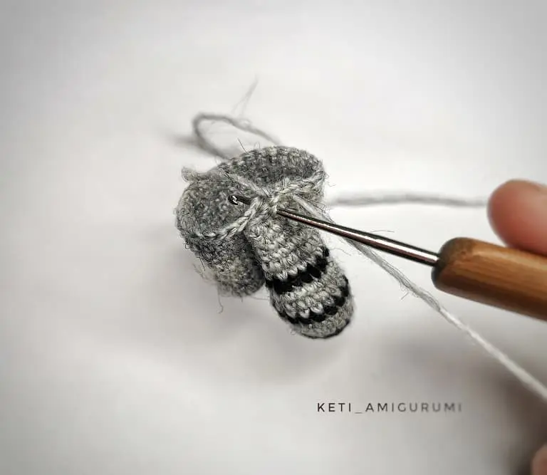 Attaching the tail to the crochet body